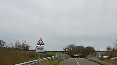 Oncoming Car at Narrow Bridge thumbnail