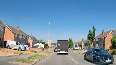 Obscured View Behind Delivery Van thumbnail