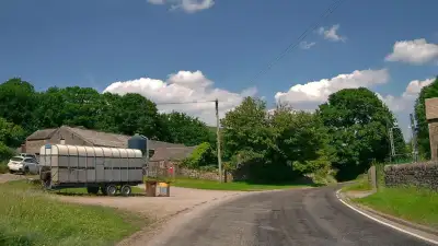 Large Truck on Narrow Rural Road thumbnail