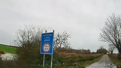 Van Pulling Out on Narrow Lane thumbnail
