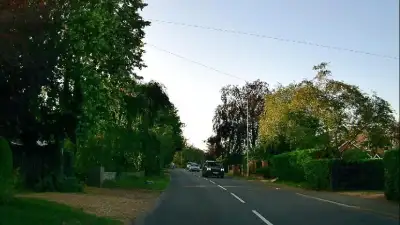 Cyclist on Residential Road thumbnail